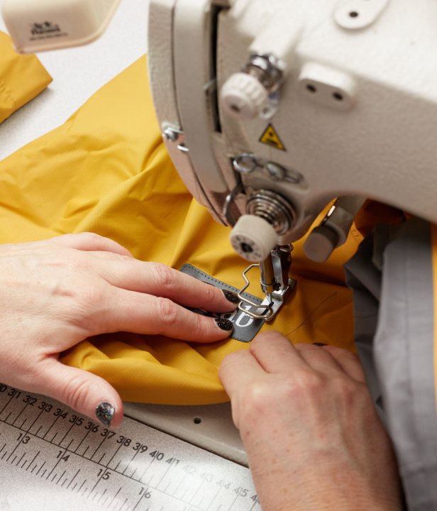 Rab regenjas repareren